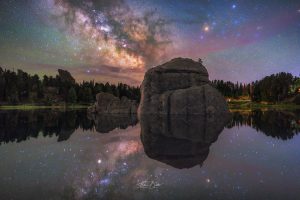 Milky Way reflection at Sylvan Lake South Dakota by Eden Bhatta