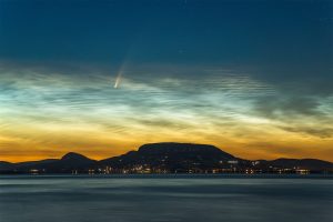NEOWISE comet behind noctilucent clouds over Lake Balaton, Hungary