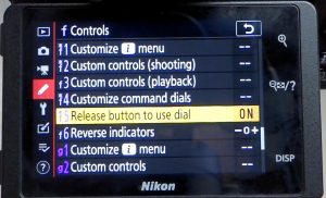 nikon release button to use dial setting
